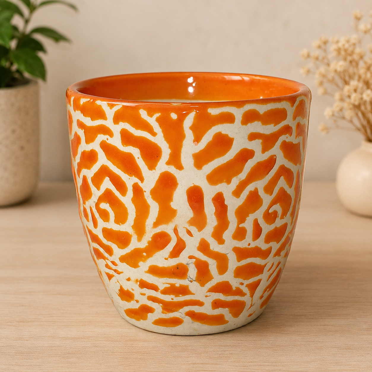vibrant orange ceramic planter